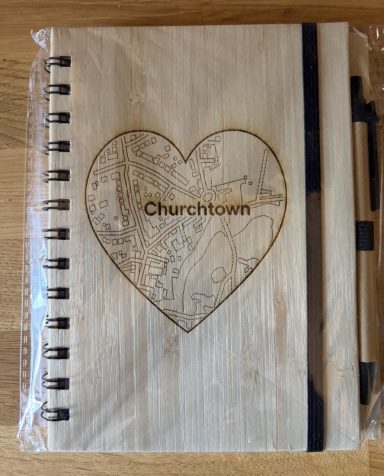 Churchtown Map Notebook Wooden notebook with a heart design and "Churchtown" engraved on the cover.